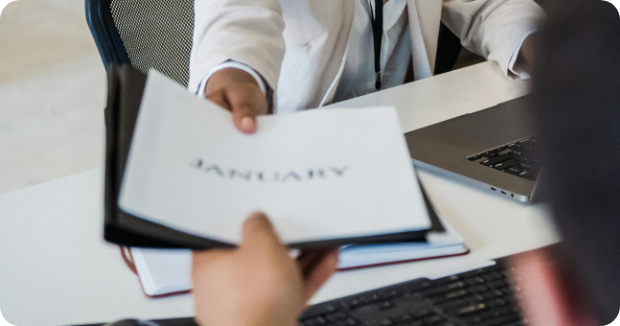financial advisor reviewing documents for tax planning and compliance services